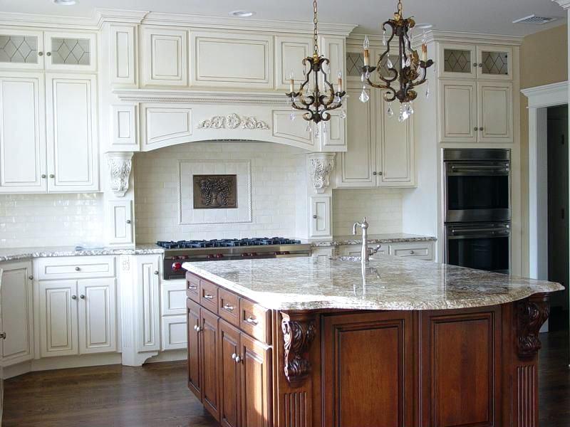 aspen white kitchen cabinets aspen white granite adds interest to this traditional kitchen with raised panel and pendant lights kitchenaid dishwasher