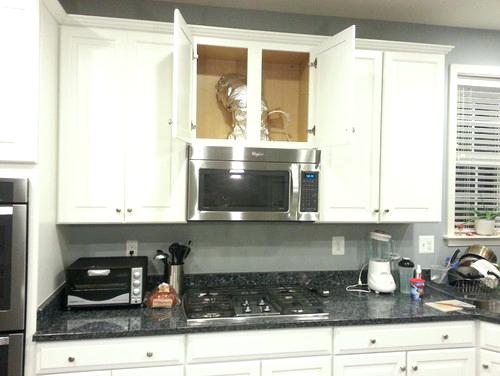 kitchen cabinets above microwave cabinet above my microwave a wine rack are there any suggestions on a design to hide the ugly vent pipe and build a rack insert inside the cabinet kitchen cabinet micr kitchen cabinets above microwave cabinet above my microwave a wine rack are there any suggestions on a design to hide the ugly vent pipe and build a rack insert inside the cabinet kitchen cabinet micr