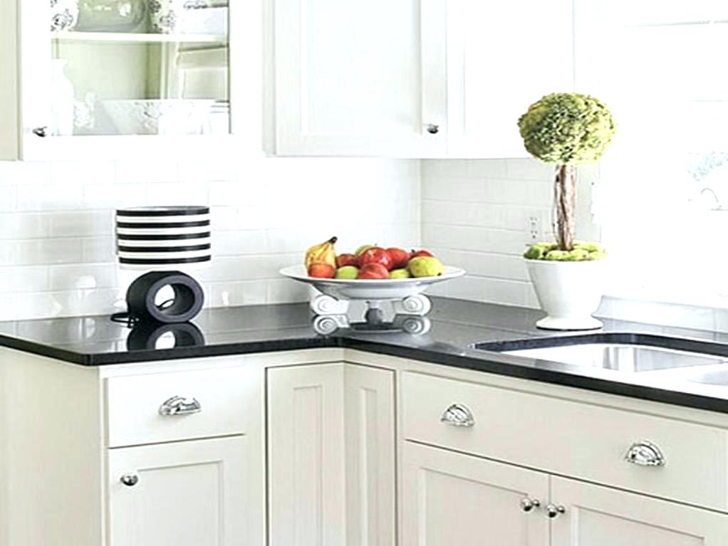 kitchen with white tiles white tile subway tiles in white color black kitchen with double sinks and faucet white white tile white kitchen floor tile designs