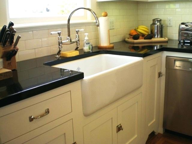 traditional kitchen faucets traditional kitchen remodeling with farmhouse style under mount sinks gloss black laminate and kohler traditional kitchen faucets